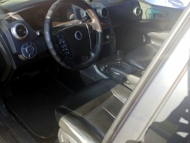 Черный Cанг Йонг Актион, объемом двигателя 2 л и пробегом 140 тыс. км за 7800 $, фото 1 на Automoto.ua