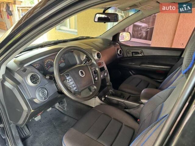 Черный Cанг Йонг Актион, объемом двигателя 2 л и пробегом 154 тыс. км за 7000 $, фото 10 на Automoto.ua