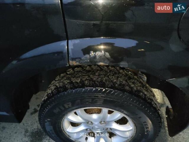 Черный Cанг Йонг Актион, объемом двигателя 2.3 л и пробегом 180 тыс. км за 4500 $, фото 10 на Automoto.ua