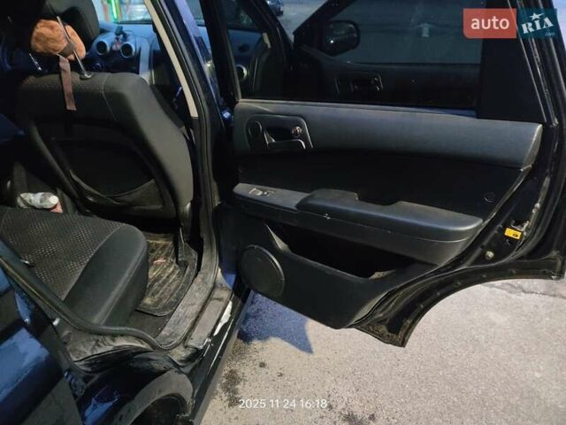 Черный Cанг Йонг Актион, объемом двигателя 2.3 л и пробегом 180 тыс. км за 4500 $, фото 9 на Automoto.ua