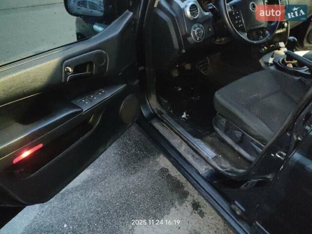 Черный Cанг Йонг Актион, объемом двигателя 2.3 л и пробегом 180 тыс. км за 4500 $, фото 6 на Automoto.ua