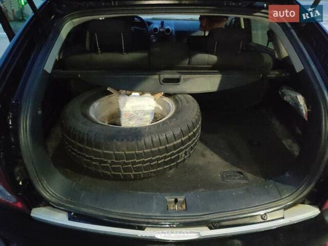 Черный Cанг Йонг Актион, объемом двигателя 2.3 л и пробегом 180 тыс. км за 4500 $, фото 11 на Automoto.ua