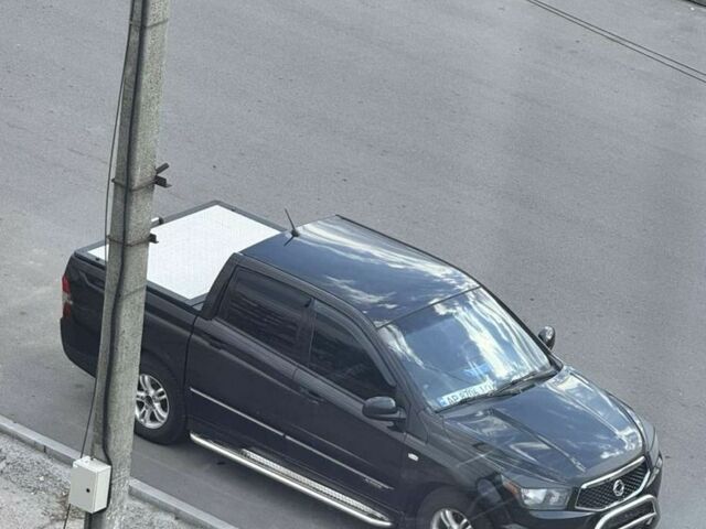 Черный Cанг Йонг Актион, объемом двигателя 2 л и пробегом 240 тыс. км за 8200 $, фото 6 на Automoto.ua