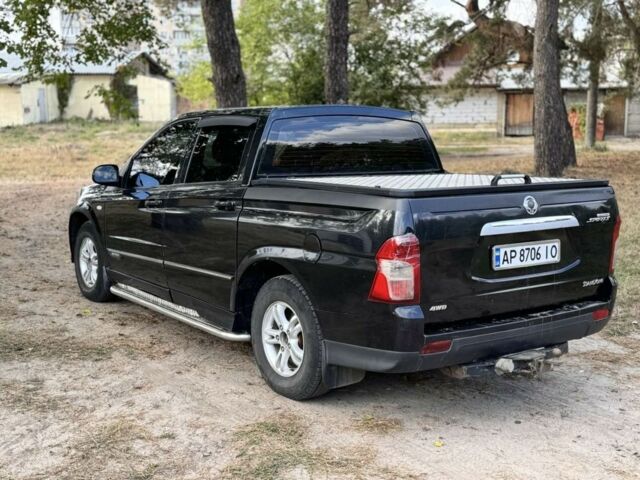 Черный Cанг Йонг Актион, объемом двигателя 2 л и пробегом 240 тыс. км за 8200 $, фото 2 на Automoto.ua