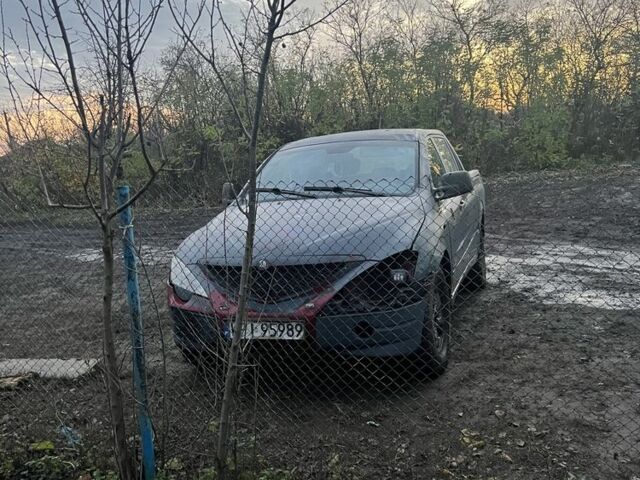 Красный Cанг Йонг Актион, объемом двигателя 2 л и пробегом 201 тыс. км за 2616 $, фото 1 на Automoto.ua