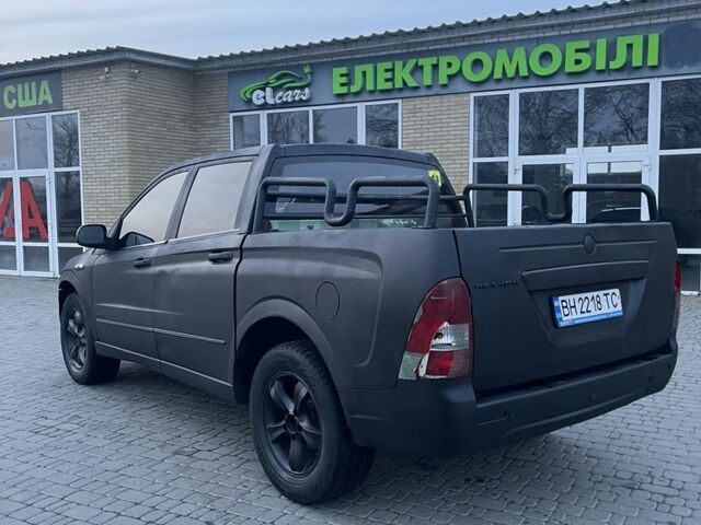 Красный Cанг Йонг Актион, объемом двигателя 2 л и пробегом 280 тыс. км за 4850 $, фото 3 на Automoto.ua