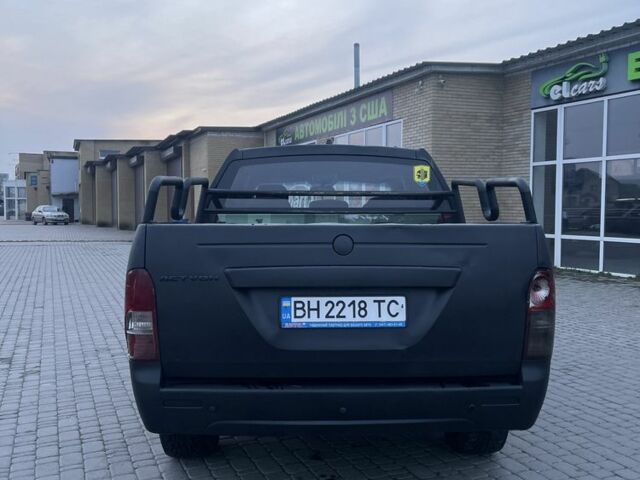 Красный Cанг Йонг Актион, объемом двигателя 2 л и пробегом 280 тыс. км за 4850 $, фото 4 на Automoto.ua