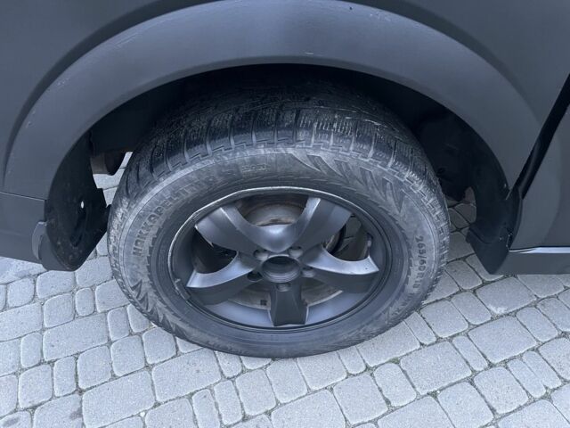 Красный Cанг Йонг Актион, объемом двигателя 2 л и пробегом 280 тыс. км за 4850 $, фото 6 на Automoto.ua