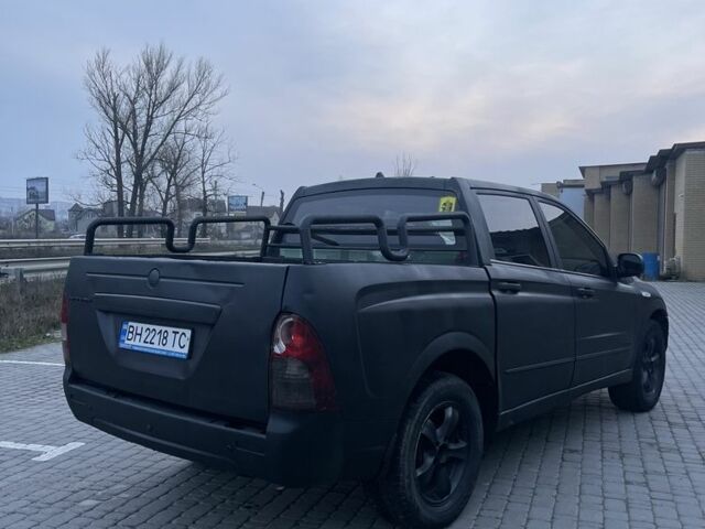 Красный Cанг Йонг Актион, объемом двигателя 2 л и пробегом 280 тыс. км за 4850 $, фото 5 на Automoto.ua