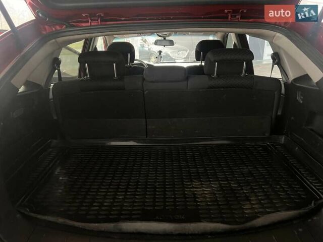 Красный Cанг Йонг Актион, объемом двигателя 2 л и пробегом 244 тыс. км за 6500 $, фото 8 на Automoto.ua