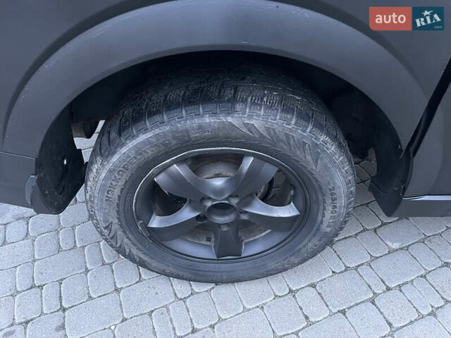 Красный Cанг Йонг Актион, объемом двигателя 2 л и пробегом 280 тыс. км за 4850 $, фото 6 на Automoto.ua