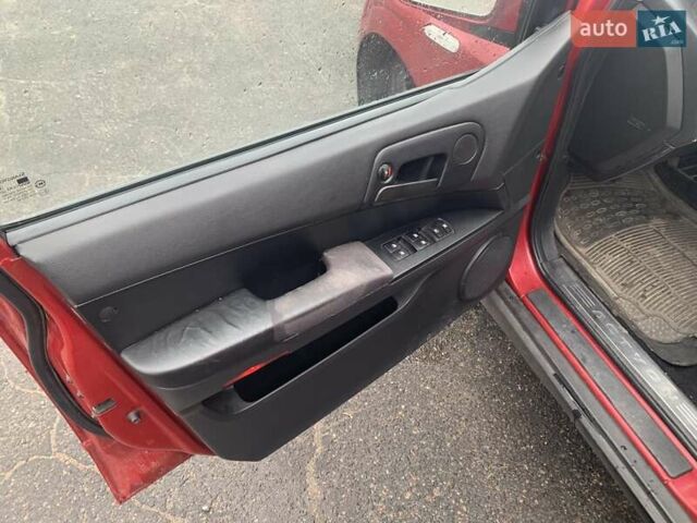 Красный Cанг Йонг Актион, объемом двигателя 2.3 л и пробегом 273 тыс. км за 4800 $, фото 12 на Automoto.ua