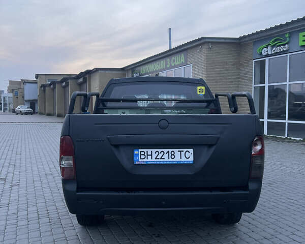 Красный Cанг Йонг Актион, объемом двигателя 2 л и пробегом 280 тыс. км за 4850 $, фото 4 на Automoto.ua