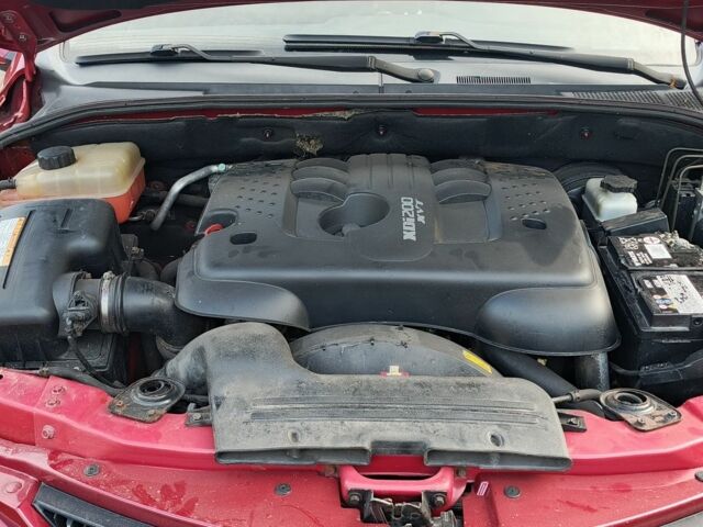 Червоний Cанг Йонг Actyon, об'ємом двигуна 2 л та пробігом 200 тис. км за 6400 $, фото 7 на Automoto.ua