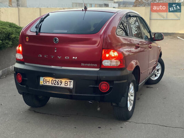 Красный Cанг Йонг Актион, объемом двигателя 2 л и пробегом 125 тыс. км за 6200 $, фото 9 на Automoto.ua