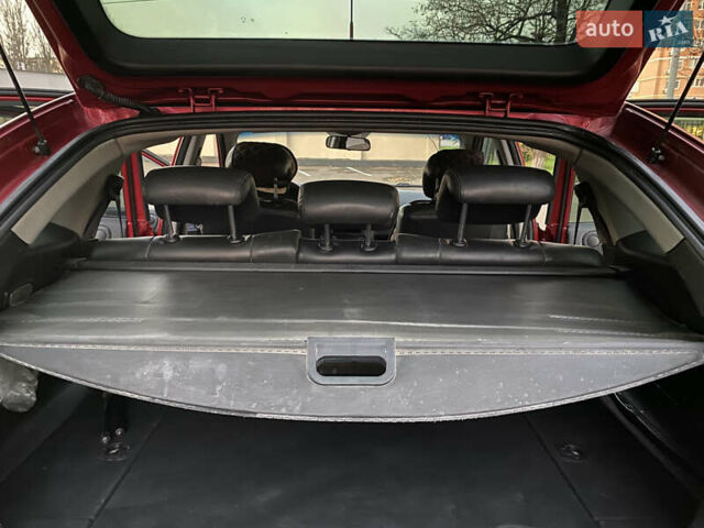 Красный Cанг Йонг Актион, объемом двигателя 2 л и пробегом 125 тыс. км за 6200 $, фото 15 на Automoto.ua