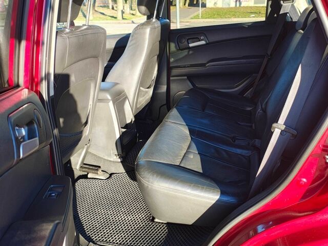 Красный Cанг Йонг Актион, объемом двигателя 2 л и пробегом 197 тыс. км за 5300 $, фото 16 на Automoto.ua