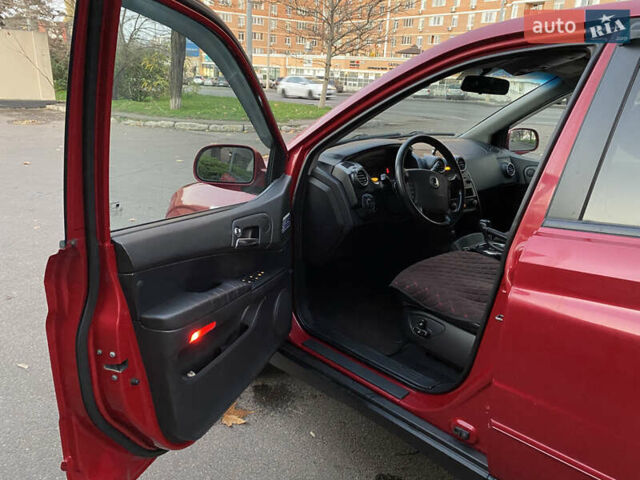 Красный Cанг Йонг Актион, объемом двигателя 2 л и пробегом 125 тыс. км за 6200 $, фото 13 на Automoto.ua