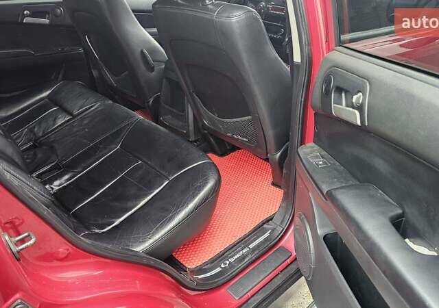 Красный Cанг Йонг Актион, объемом двигателя 2 л и пробегом 170 тыс. км за 4600 $, фото 16 на Automoto.ua