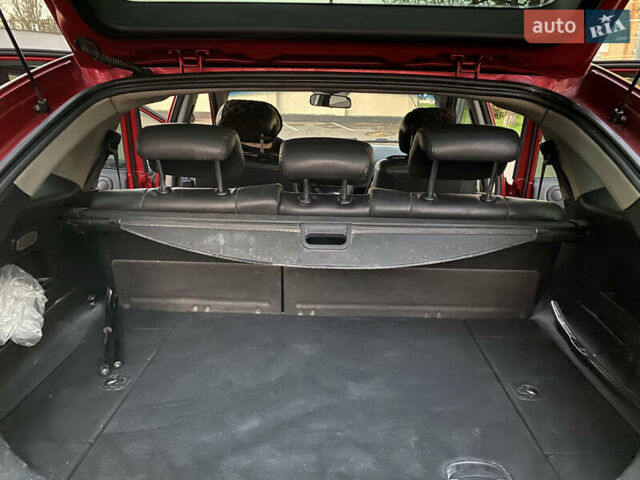 Красный Cанг Йонг Актион, объемом двигателя 2 л и пробегом 125 тыс. км за 6200 $, фото 16 на Automoto.ua