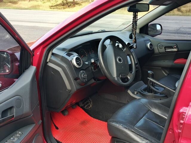 Червоний Cанг Йонг Actyon, об'ємом двигуна 2 л та пробігом 200 тис. км за 6400 $, фото 6 на Automoto.ua