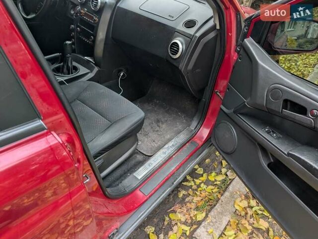 Красный Cанг Йонг Актион, объемом двигателя 2.3 л и пробегом 176 тыс. км за 6500 $, фото 2 на Automoto.ua