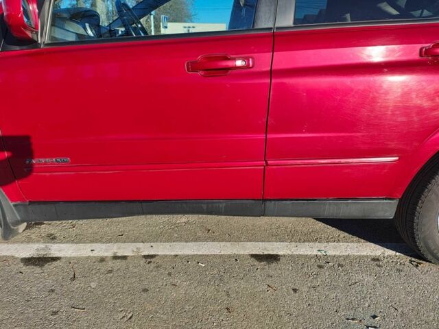 Красный Cанг Йонг Актион, объемом двигателя 2 л и пробегом 197 тыс. км за 5300 $, фото 2 на Automoto.ua