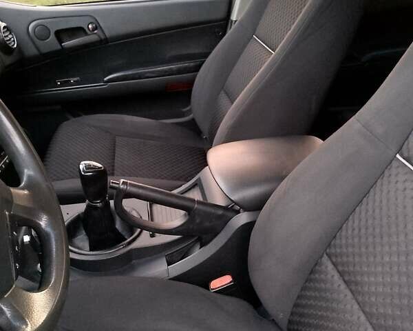 Сірий Cанг Йонг Actyon, об'ємом двигуна 2 л та пробігом 220 тис. км за 5200 $, фото 2 на Automoto.ua