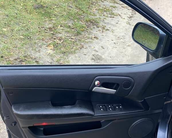 Серый Cанг Йонг Актион, объемом двигателя 2.3 л и пробегом 243 тыс. км за 4500 $, фото 13 на Automoto.ua