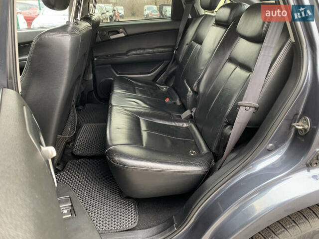 Серый Cанг Йонг Актион, объемом двигателя 2.3 л и пробегом 244 тыс. км за 4755 $, фото 23 на Automoto.ua