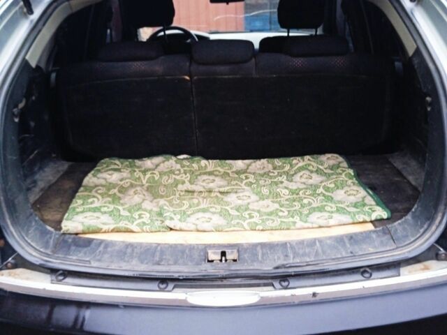 Серый Cанг Йонг Актион, объемом двигателя 2 л и пробегом 200 тыс. км за 5500 $, фото 5 на Automoto.ua