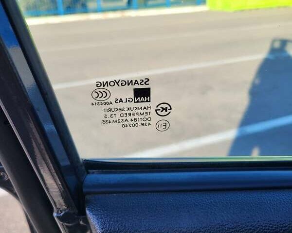 Серый Cанг Йонг Актион, объемом двигателя 2 л и пробегом 180 тыс. км за 5200 $, фото 21 на Automoto.ua