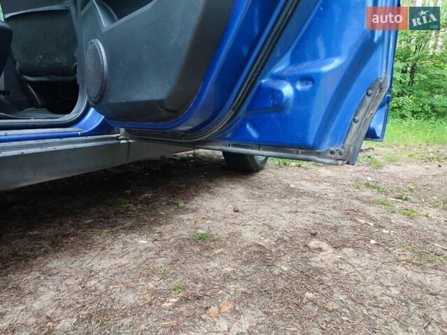 Синий Cанг Йонг Актион, объемом двигателя 2 л и пробегом 134 тыс. км за 7700 $, фото 18 на Automoto.ua