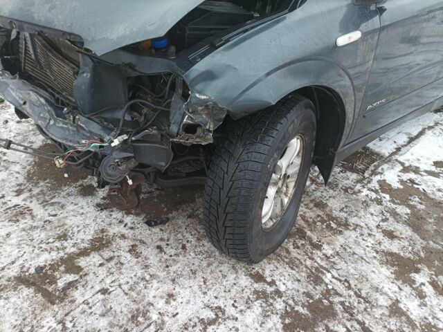 Синий Cанг Йонг Актион, объемом двигателя 2 л и пробегом 281 тыс. км за 2400 $, фото 2 на Automoto.ua