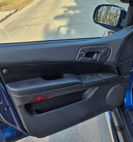 Синий Cанг Йонг Актион, объемом двигателя 2 л и пробегом 34 тыс. км за 13700 $, фото 20 на Automoto.ua