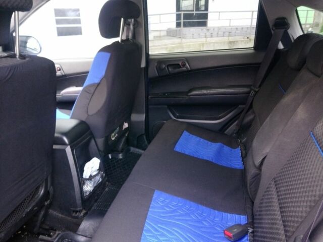 Синий Cанг Йонг Актион, объемом двигателя 2 л и пробегом 200 тыс. км за 5500 $, фото 5 на Automoto.ua