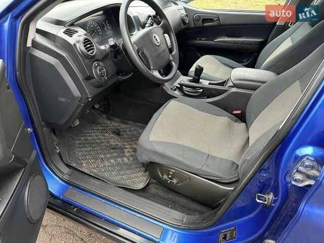 Синий Cанг Йонг Актион, объемом двигателя 2 л и пробегом 173 тыс. км за 5200 $, фото 10 на Automoto.ua