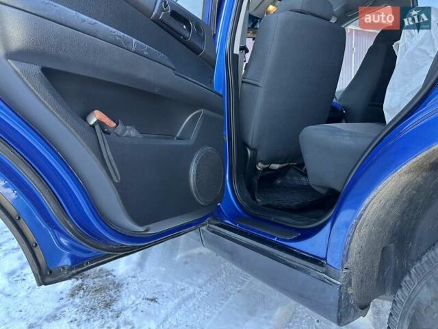 Синий Cанг Йонг Актион, объемом двигателя 2 л и пробегом 170 тыс. км за 5650 $, фото 16 на Automoto.ua