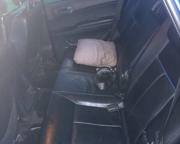 Синий Cанг Йонг Актион, объемом двигателя 2 л и пробегом 216 тыс. км за 5400 $, фото 11 на Automoto.ua