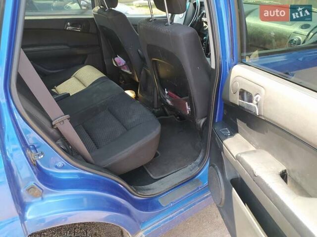 Синий Cанг Йонг Актион, объемом двигателя 2 л и пробегом 219 тыс. км за 5300 $, фото 3 на Automoto.ua