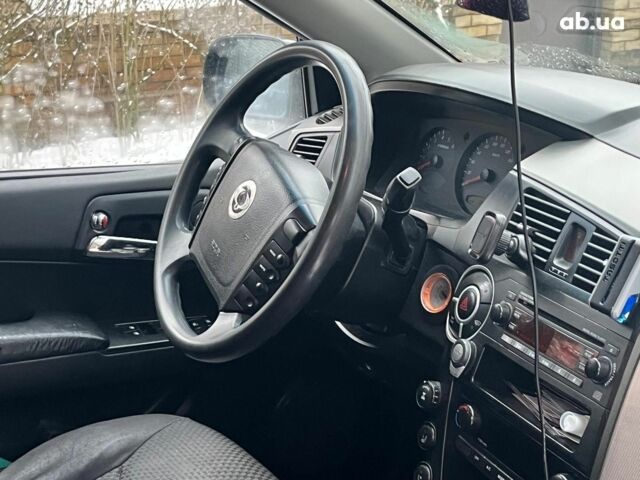 Черный Cанг Йонг Кирон Делюкс, объемом двигателя 2 л и пробегом 285 тыс. км за 4490 $, фото 32 на Automoto.ua