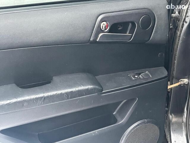 Черный Cанг Йонг Кирон Делюкс, объемом двигателя 2 л и пробегом 285 тыс. км за 4490 $, фото 25 на Automoto.ua