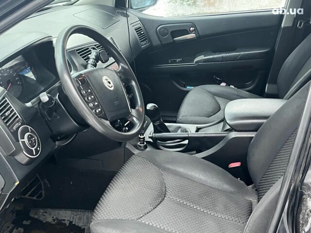 Черный Cанг Йонг Кирон Делюкс, объемом двигателя 2 л и пробегом 285 тыс. км за 4490 $, фото 16 на Automoto.ua
