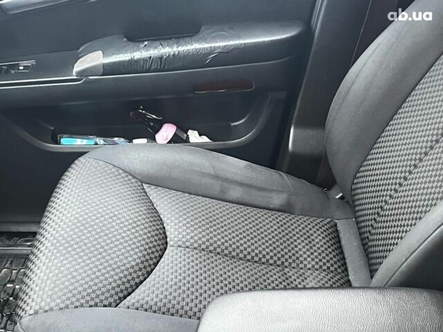 Черный Cанг Йонг Кирон Делюкс, объемом двигателя 2 л и пробегом 285 тыс. км за 4490 $, фото 22 на Automoto.ua