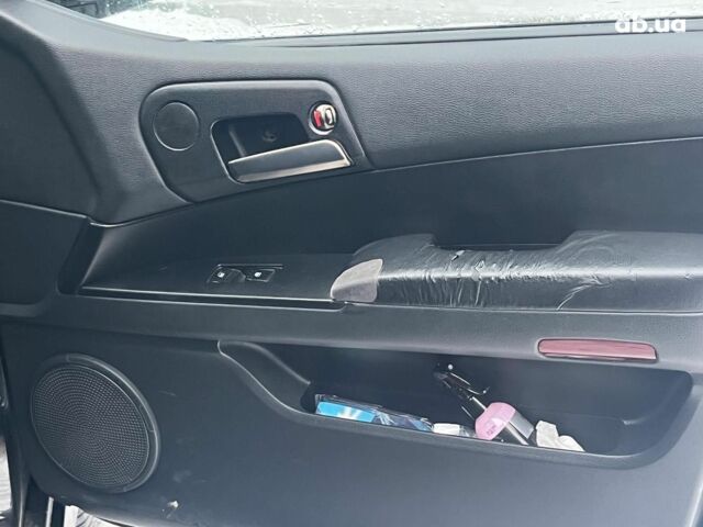 Черный Cанг Йонг Кирон Делюкс, объемом двигателя 2 л и пробегом 285 тыс. км за 4490 $, фото 30 на Automoto.ua