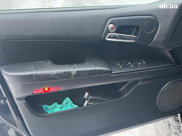 Черный Cанг Йонг Кирон Делюкс, объемом двигателя 2 л и пробегом 285 тыс. км за 4490 $, фото 14 на Automoto.ua