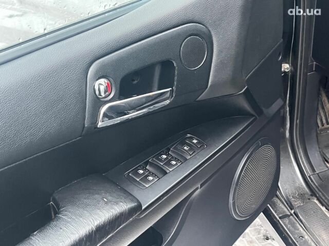 Черный Cанг Йонг Кирон Делюкс, объемом двигателя 2 л и пробегом 285 тыс. км за 4490 $, фото 15 на Automoto.ua