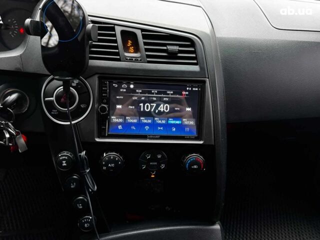 Сірий Cанг Йонг KYRON DELUXE, об'ємом двигуна 2 л та пробігом 220 тис. км за 8390 $, фото 15 на Automoto.ua