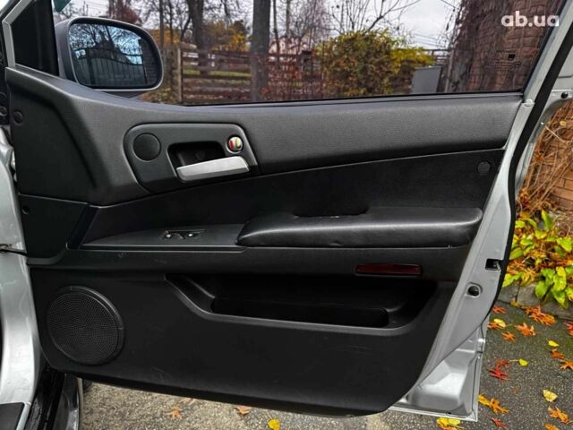 Сірий Cанг Йонг KYRON DELUXE, об'ємом двигуна 2 л та пробігом 220 тис. км за 8390 $, фото 25 на Automoto.ua