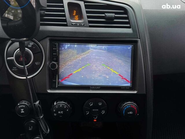 Сірий Cанг Йонг KYRON DELUXE, об'ємом двигуна 2 л та пробігом 220 тис. км за 8390 $, фото 16 на Automoto.ua